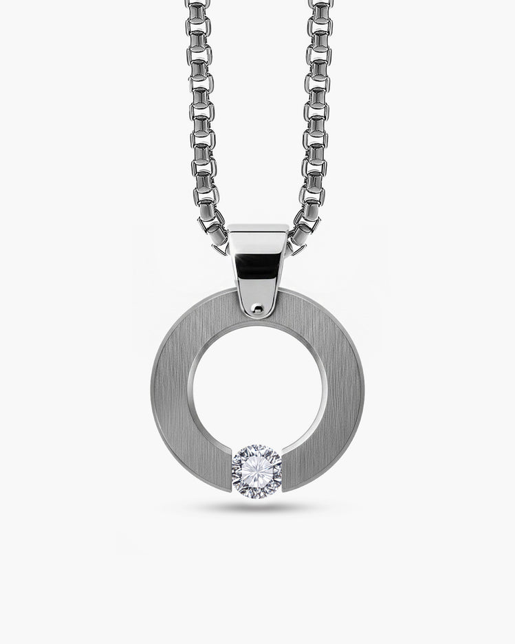 taormina-abbracci-round-pendant-stainless-steel-tension-set-white-sapphire-front