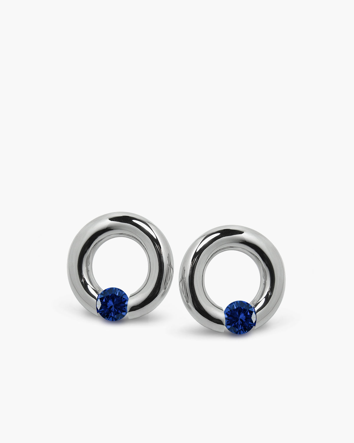 taormina-luna-stud-earrings-tension-set-blue-sapphire