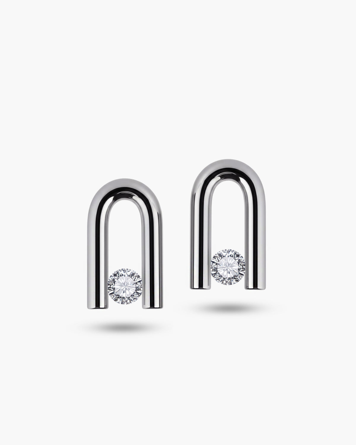 taormina-nexus-stud-earrings-tension-set-white-sapphire-front