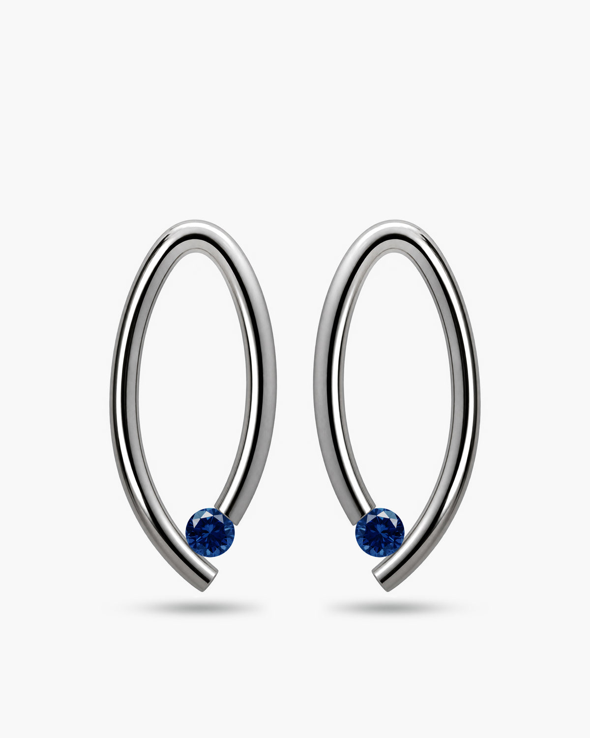 taormina-ovum-stud-earrings-stainless-steel-tension-set-blue-sapphire