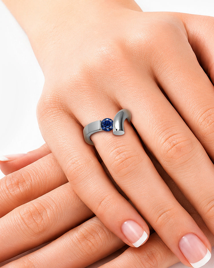 taormina-profilo-tension-set-ring-blue-sapphire-model-hand